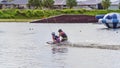 Adult Helps Child To Kneeboard