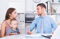 Adult male lawyer talking with young woman