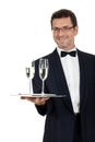 Adult male waiter serving two glass of champagne isolated Royalty Free Stock Photo