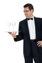Adult male waiter serving two glass of champagne isolated Royalty Free Stock Photo