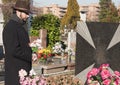 Adult Man at Cemetery Royalty Free Stock Photo