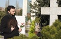 Adult Man at Cemetery Royalty Free Stock Photo