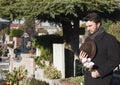 Adult Man at Cemetery Royalty Free Stock Photo