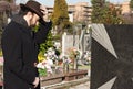 Adult Man at Cemetery Royalty Free Stock Photo