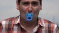 Adult Man Crying With Pacifier