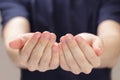 Adult man cupped hands showing something Royalty Free Stock Photo