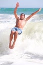 Adult Man Enjoying The Summer On The Beach