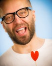 Adult man with heart on stick Royalty Free Stock Photo