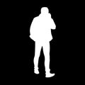 Adult man in jacket walking. White silhouette isolated on black background. Front view. Monochrome vector illustration