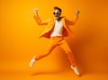 Adult man jump attractive positive fashion style fun action modern trendy orange guy handsome black