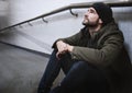 Adult Man Sitting Hopeless on The Floor Royalty Free Stock Photo