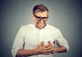 Adult man suffering from severe sharp heartache, chest pain Royalty Free Stock Photo