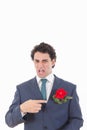 Adult man in suit with disgust face expression showing with his Royalty Free Stock Photo