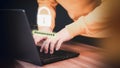 Adult man typing his user and password on a computer laptop. Cyber security concept to protect personal data. Royalty Free Stock Photo