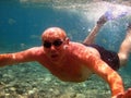 Adult man under water