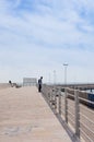 Adult man visits the city of Bari, view from the pier, Italy