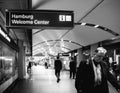 Adult Man walking inside Hamburg airport Royalty Free Stock Photo