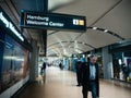 Adult Man walking inside Hamburg airport near Hamburg Welcome Ce Royalty Free Stock Photo