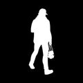 Adult man in warm jacket and baseball cap walking. White silhouette isolated on black background. Front view. Monochrome