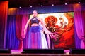 Young girls dance indian dance in a sari on stage