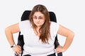 Adult overweight woman with glasses sitting on chair waiting documents file for job interview. Serious angry