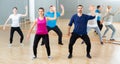 Adult people training in dance studio Royalty Free Stock Photo