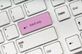 Adult only pink key button Online sex concept Royalty Free Stock Photo