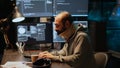 Adult programmer with neck collar foam coding html script Royalty Free Stock Photo