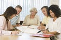 Adult students studying together Royalty Free Stock Photo