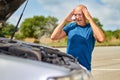 Adult upset driver man in front of automobile crash car collision accident Royalty Free Stock Photo