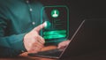 Adult user man login with fingerprint scanning technology in the computer laptop.