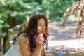 Adult woman blowing soap bubbles Royalty Free Stock Photo