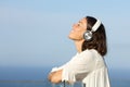 Adult woman breathing relaxing listening to music Royalty Free Stock Photo