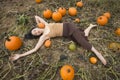 Adult woman dancing in a Connecticut pumpkin patch in autumn Royalty Free Stock Photo