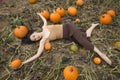 Adult woman dancing in a Connecticut pumpkin patch in autumn Royalty Free Stock Photo