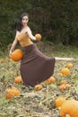 Adult woman dancing in a Connecticut pumpkin patch in autumn Royalty Free Stock Photo