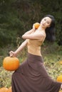 Adult woman dancing in a Connecticut pumpkin patch in autumn Royalty Free Stock Photo