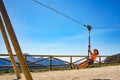 Adult woman having fun on zipline Royalty Free Stock Photo