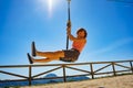 Adult woman having fun on zipline Royalty Free Stock Photo