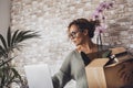 Adult woman lost his job and move her stuffs from the desk. Adult female people with box and personal things inside in front of Royalty Free Stock Photo