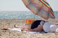 Adult woman overweight on the beach