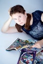 Adult woman reading comics books