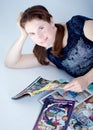 Adult woman reading comics books