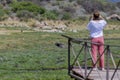 Adult woman on a safari in the African savannah