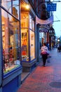 An adult woman strolls through downtown Royalty Free Stock Photo