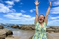 an adult woman of 35-45 years old, great joy is expressed on her face, she raised her hands, opened her mouth and is Royalty Free Stock Photo