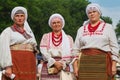 Adult women wear traditional clothes of Ukrainian historical region Podillya, shirts, blouses, skirts, embroidery, necklaces