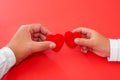 Adults and children hands holding red hearts, healthcare, donation and family insurance concept, world heart day, world health day Royalty Free Stock Photo