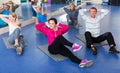 Adults doing pilates routine Royalty Free Stock Photo