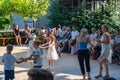 Adults and elementary students dancing together at the schÃÂ¼tzenmatt on the 4th of july at jugendfest brugg 2019